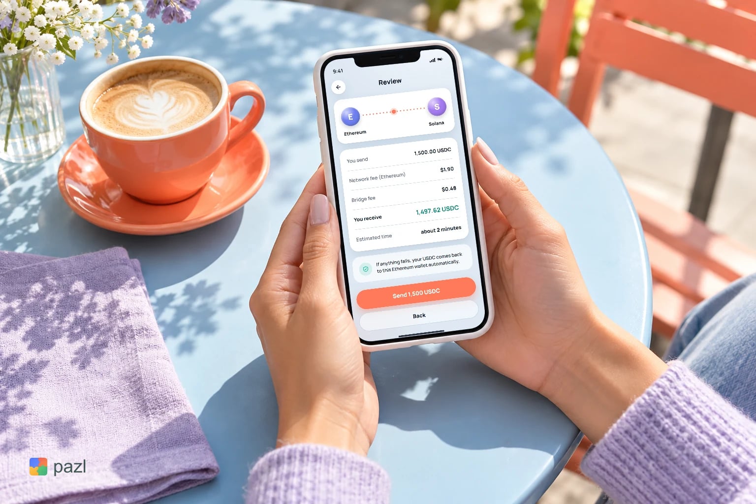 Hände halten ein Smartphone mit dem Prüfbildschirm von Rowan an einem Cafétisch, neben einem Kaffee